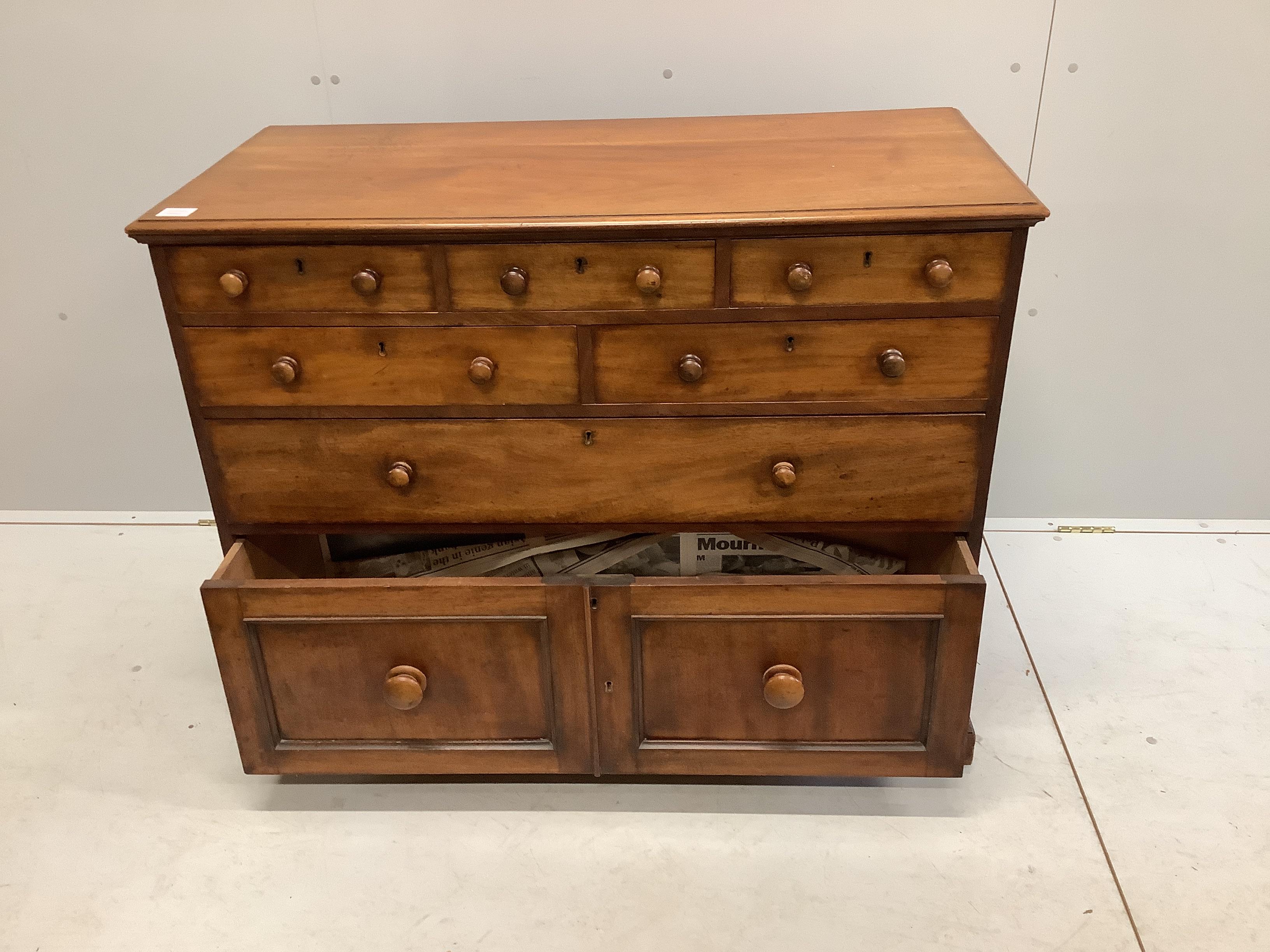 A Victorian mahogany chest fitted with an arrangement of seven drawers, width 110cm, depth 52cm, height 87cm